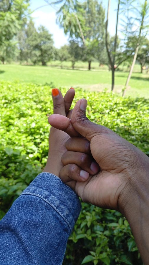 In green wilds we weave our fingers, nature’s hush wraps ou…